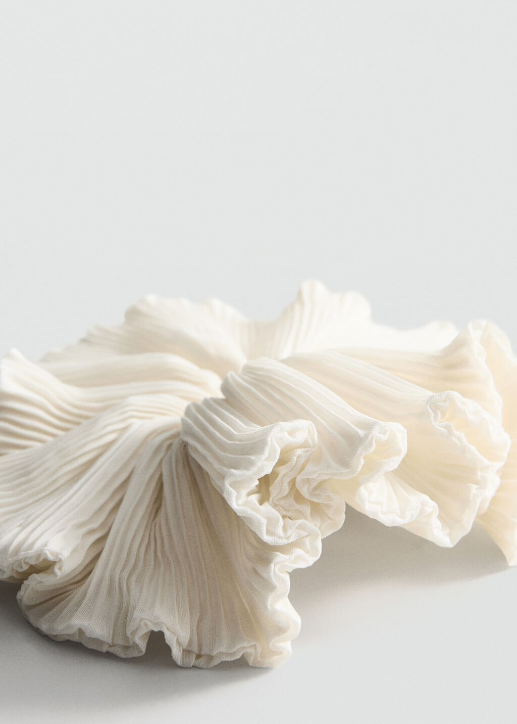 Banda-Pleats-crudo